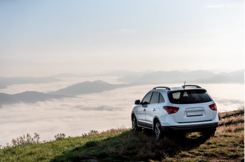 SUV overlooking Cliff